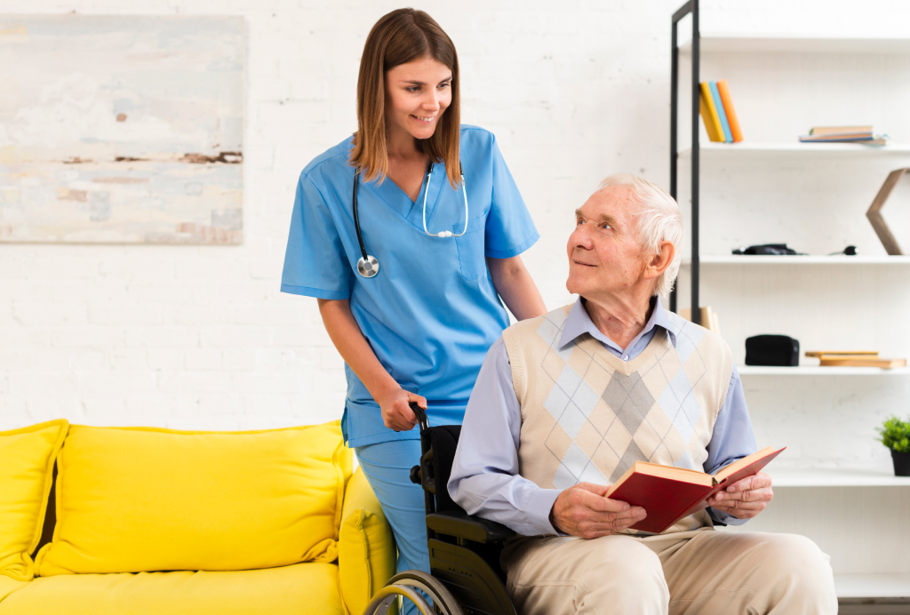 An SM24 carer talking with a resident